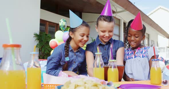 Group of happy friends using digital tablet 4k alt