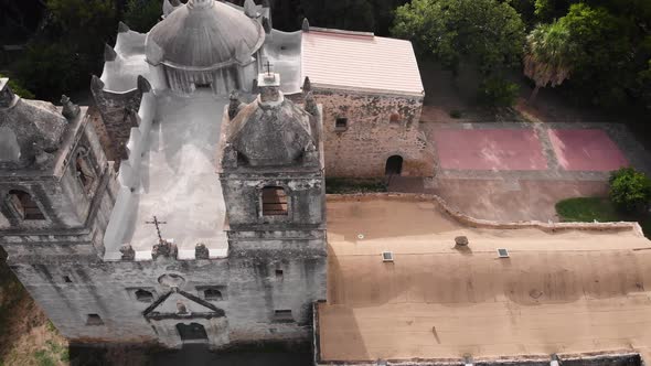 A drone captures the architecture of the oldest unrestored stone church, Mission Concepcion, in San alt