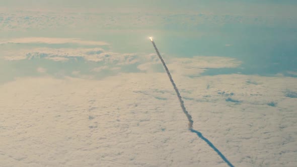 Rocket leaves the atmosphere and enters space. Rocket launch into the atmosphere.