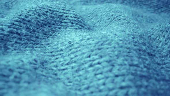 Extreme Detail View of Sheep Wool Cloth Texture Flowing in Macro Dolly Shot alt