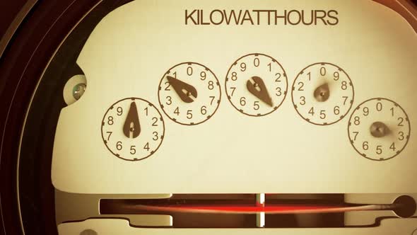 Analog electricity meter showing household consumption in kilowatt hours. alt