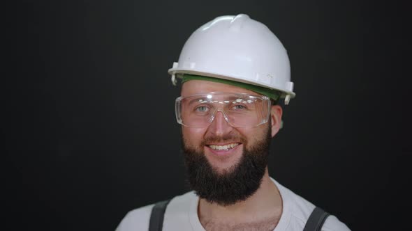 Construction Worker or Skilled Master is Smiling to Camera Portrait of Laborer alt