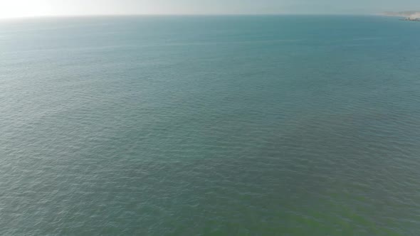 Static Aerial of Expansive Ocean to the Horizon alt