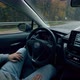 One Man Rests in a Car While It Drives on Autopilot - VideoHive Item for Sale