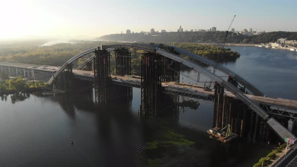 Aerial View of the Unfinished PodolskoVoskresensky Bridge Across the Dnieper River in Kiev Ukraine
