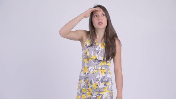 Young Beautiful Multi-ethnic Tourist Woman Searching Something alt