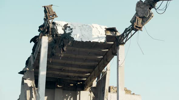 High Reach Machine Trashing Destroyed Construction by Demolition Tool, Upheaval alt