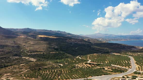A View From Above the Landscape of the Greek Island of Crete. The Camera Moves Backwards Showing