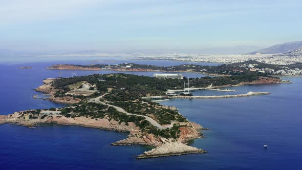 Greece, Athens riviera coast, Vouliagmeni bay, calm sea and blue sky background alt