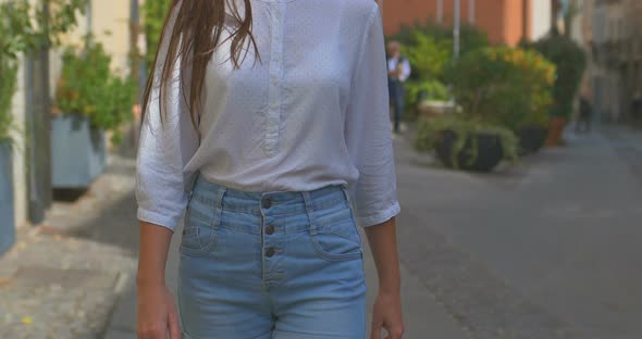 Beautiful Woman Walks on the Old European City alt