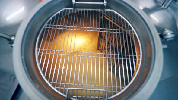 Steel Cistern with Milk Whey Getting Processed in It alt