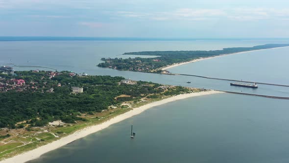 Ship Goes Through Strait of Baltiysk Separating the Vistula Lagoon From Gdansk Bay alt