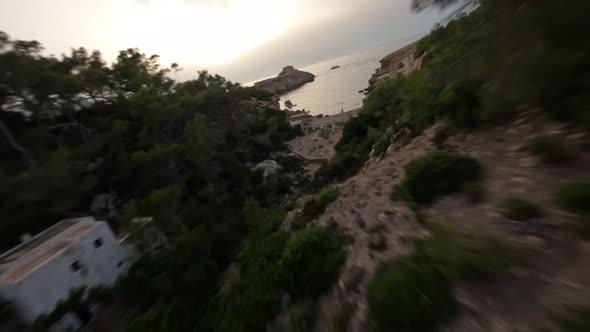Dynamic Fpv Shot Flying Along the Sunset Cliffs and Blue Sea