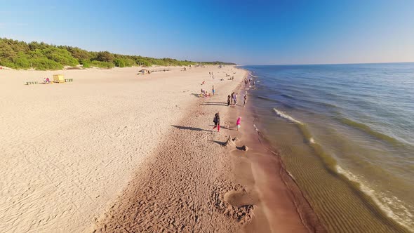 Baltic Coast With Tourists In Summer Timelapse alt