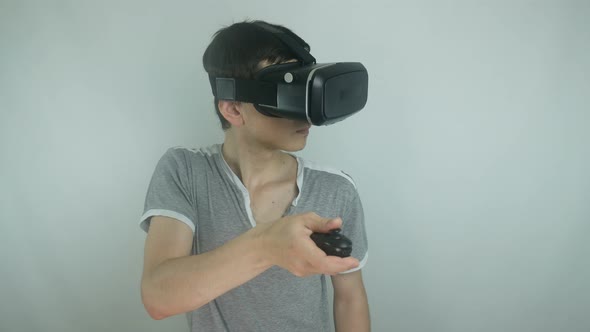 Guy Is Playing In The Helmet Of Virtual Reality