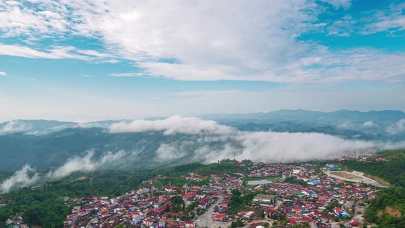 Time lapse: sunrise at Phongsali, North Laos near China. Yunnan style town on scenic mountain ridge alt