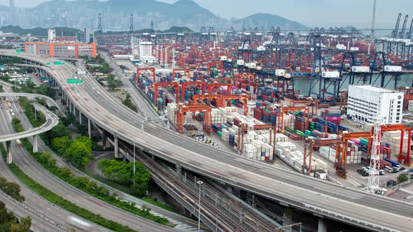 Hong Kong Container Port Terminal and Logistics Center Timelapse Pan Up alt