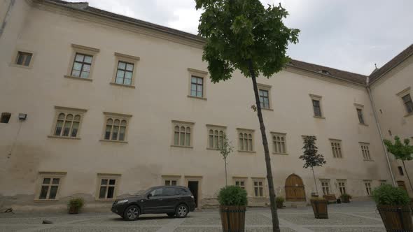 Windows in the courtyard at Fagaras fortress alt