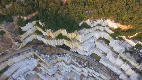 Aerial View of a Large Marble Quarry During Sunset alt