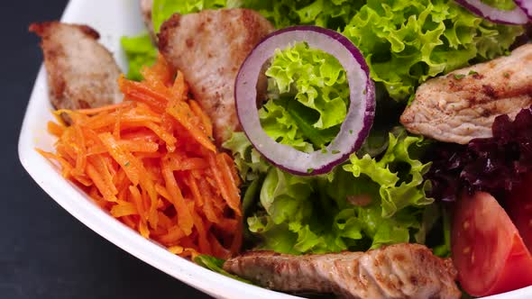 Fresh Salad with Vegetables and Stir-Fried Turkey Strips. alt