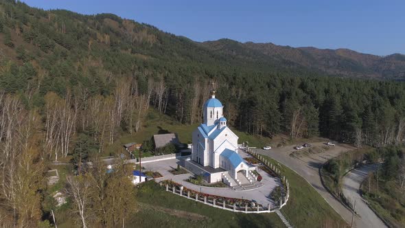 Aerial View on Church in Forest alt