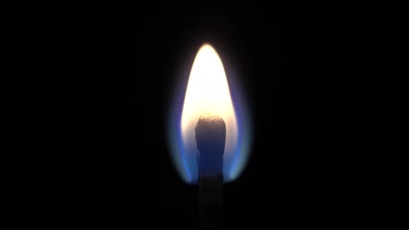 One Match Is Burning On A Black Background, Close Up, Beautiful Fire