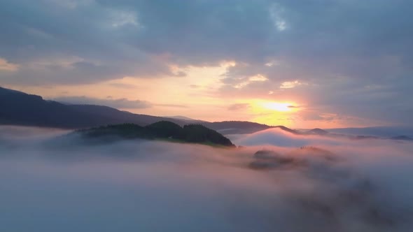 Aerial Sunrise above Clouds alt