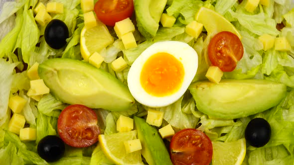Festive, vitamin green salad is on the platter
