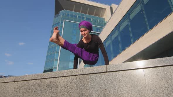 Bottom View Muslim Islamic Strong Athletic Woman Strength Power Girl in Hijab Doing Balance on Hands alt