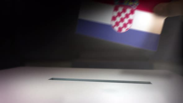Croatia__election_box_hand.mov.video.mov alt