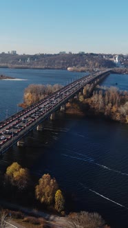 Traffic of Trucks Cars Buses on the Bridge Aerial Vertical View