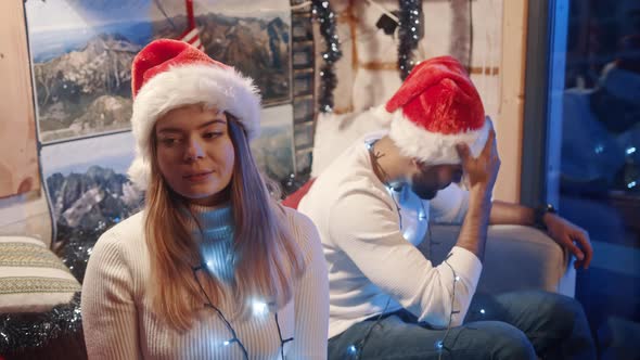 Young Caucasian Couple Having an Argument on Christmas Eve alt