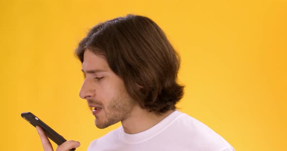 Close Up Portrait Young Sad Man Talking Cellphone Shouting Phone Listening To Answer alt