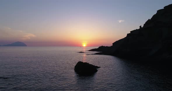 Aerial View of a Colorful Sunset Above the Sea Aeolian Islands alt