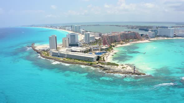 Aerial View of Cancun Mexico Showing Luxury Resorts and Blue Turquoise Beach alt