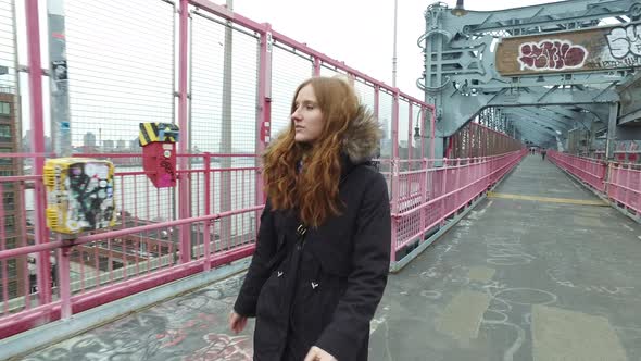 Young adult woman walking on street in New York