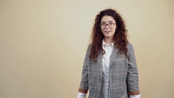 The Young Woman Who Comes in the Center on the Right with Two Cardboard Bags From Shopping and alt