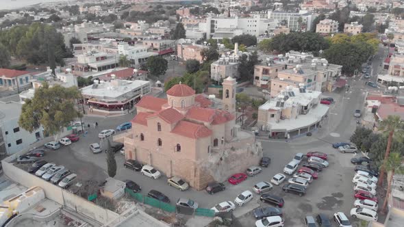 4K Aerial Drone view of the Agioi Anargyroi Church in Paphos, Cyprus alt