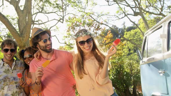 Group of hipster friends embracing and having fun alt