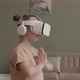 Little Girl in VR Headset Meditating at Home - VideoHive Item for Sale
