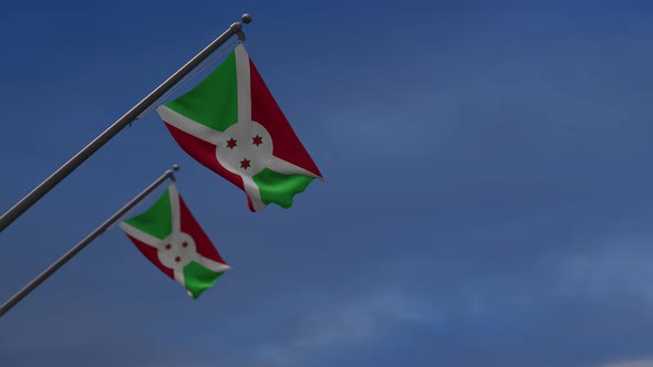 Burundi flags in the blue sky - 4K