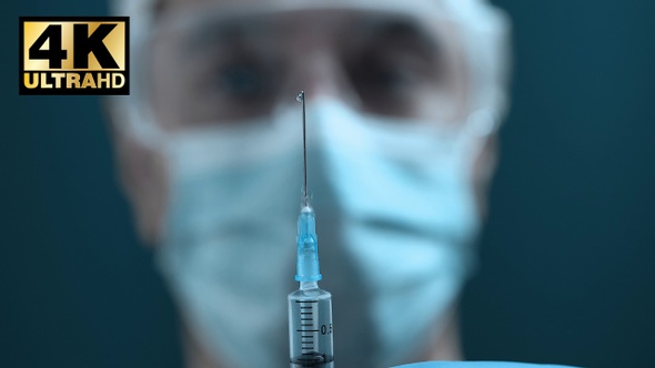 Medical Personnel Prepares Vaccine Cure For Coronavirus Injection By Doctor 