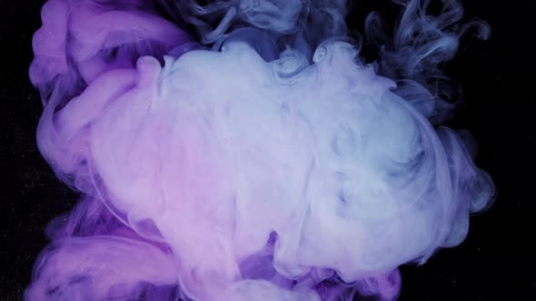 Vivid Colorful Purple Blue Pink of Acrylic Paint Drop Cloud Motion Texture Background alt