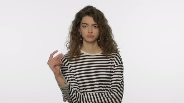 Confused Woman Not Understand Question in Studio alt