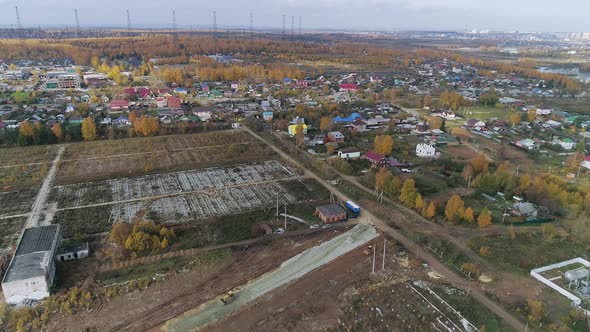 Aerial view of Construction site on the outskirts of the village. 13 alt