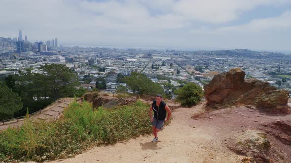 Asian Man Trail Running In San Francisco alt