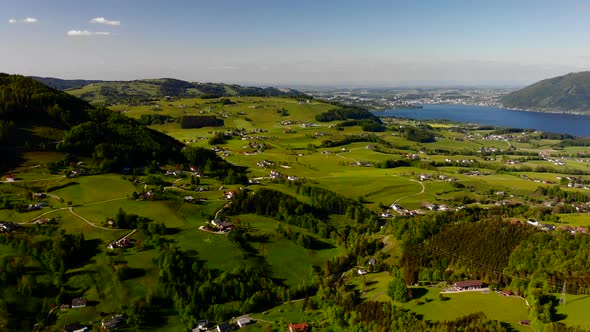 Beautiful view from the Mountains on an lake and a village alt
