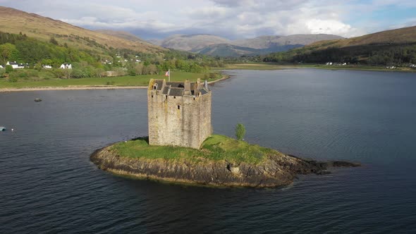 Aerial view of Castle Stalker and lake Loch Linnhe in Scotland alt