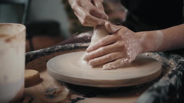 Close Up of Potter Clay Wheel Pottery Workshop Woman Making Diy Pot to Sale in Ecommerce Store Home alt