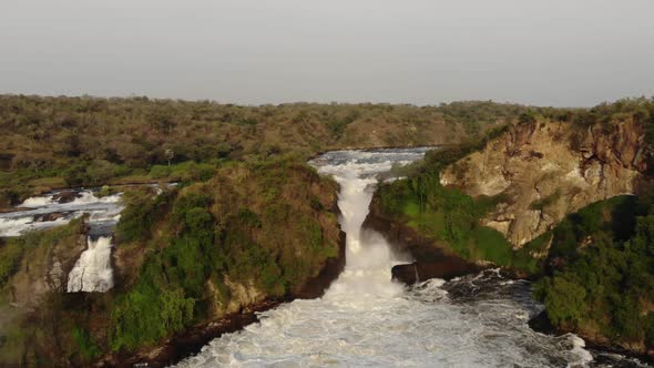 Drone Shot Over the African River NIle in a Bay and a Powerful Waterfall